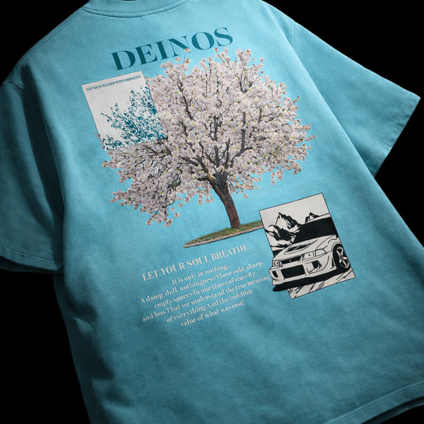 Deinos Nature x Machine teal oversized t-shirt front view – cherry blossom tree and car graphic DTF print – 240 GSM Indian streetwear